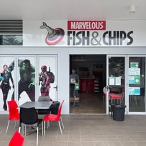 Marvelous Fish & Chips shopfront with Avengers decor