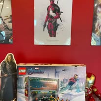 Deadpool poster and Lego Avengers display inside the shop
